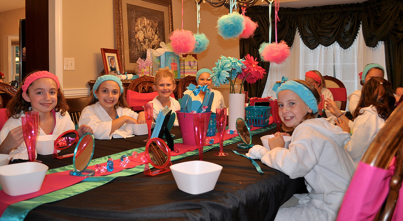 Girls in robes and spa headbands at an It's My Party mobile spa party